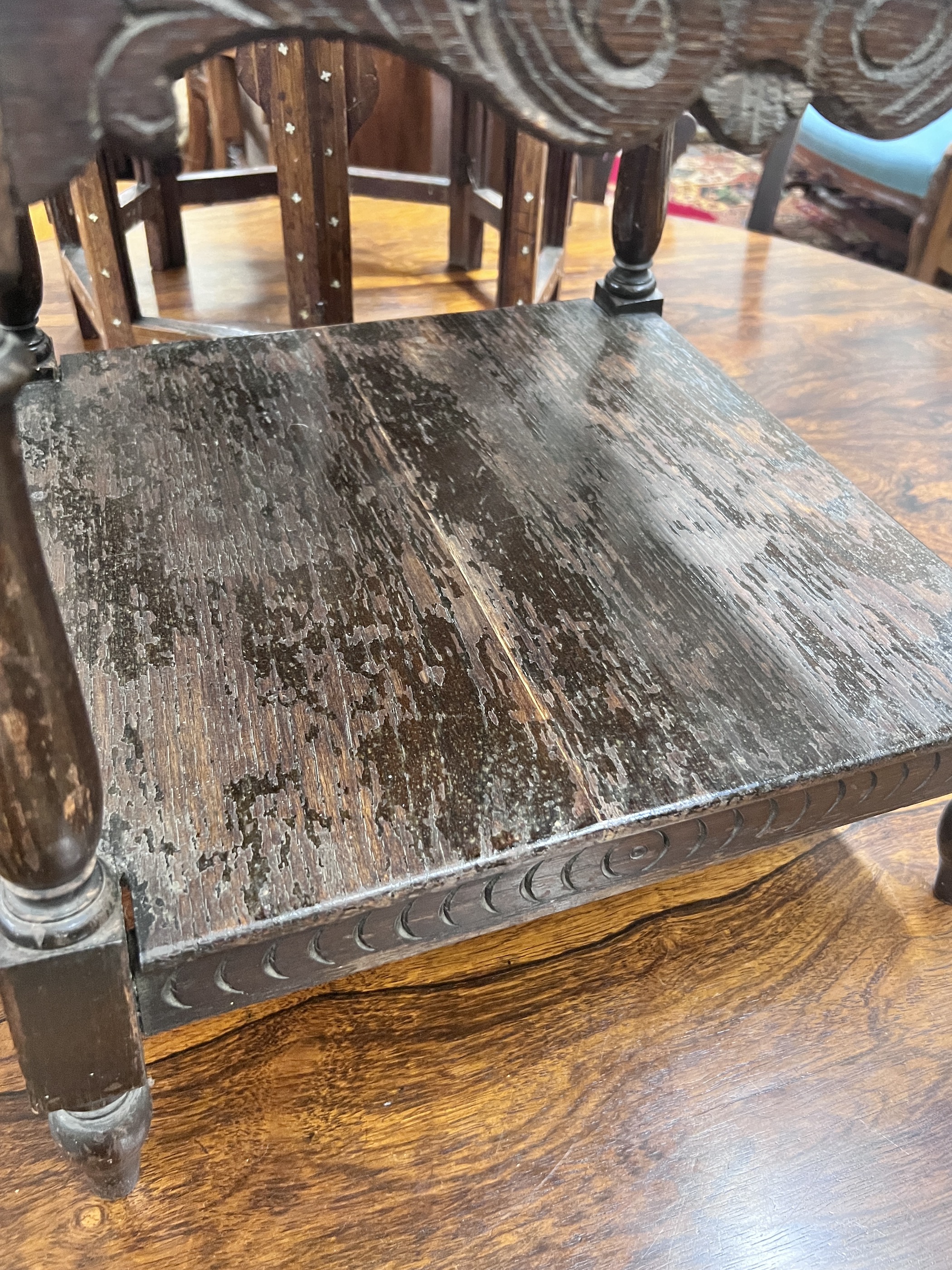 An early 20th century oak three tier occasional table, width 41cm, height 75cm